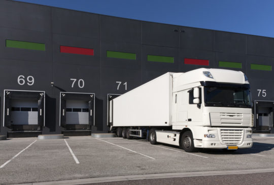 Loading bay for loading and unloading trucks